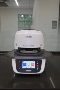 Ivoclar Programat P310 ceramic furnace used for firing and glazing custom porcelain crowns in Premier Prosthodontics in-house lab.